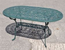 A green painted aluminum garden table,