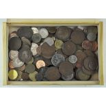 A collection of coins, including European examples of various sizes,