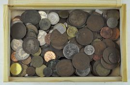 A collection of coins, including European examples of various sizes,