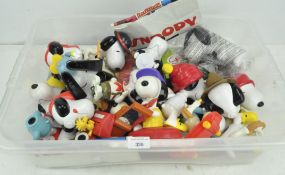 A large quantity of McDonalds plastic Snoopy related toys and figures,