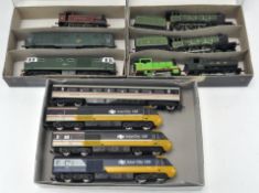 Two Hornby 00 gauge Diesel Locomotives together with a locomotive in maroon and others