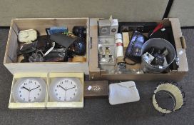 A small selection of contemporary desk and wall clocks, together with a quantity of sunglasses,