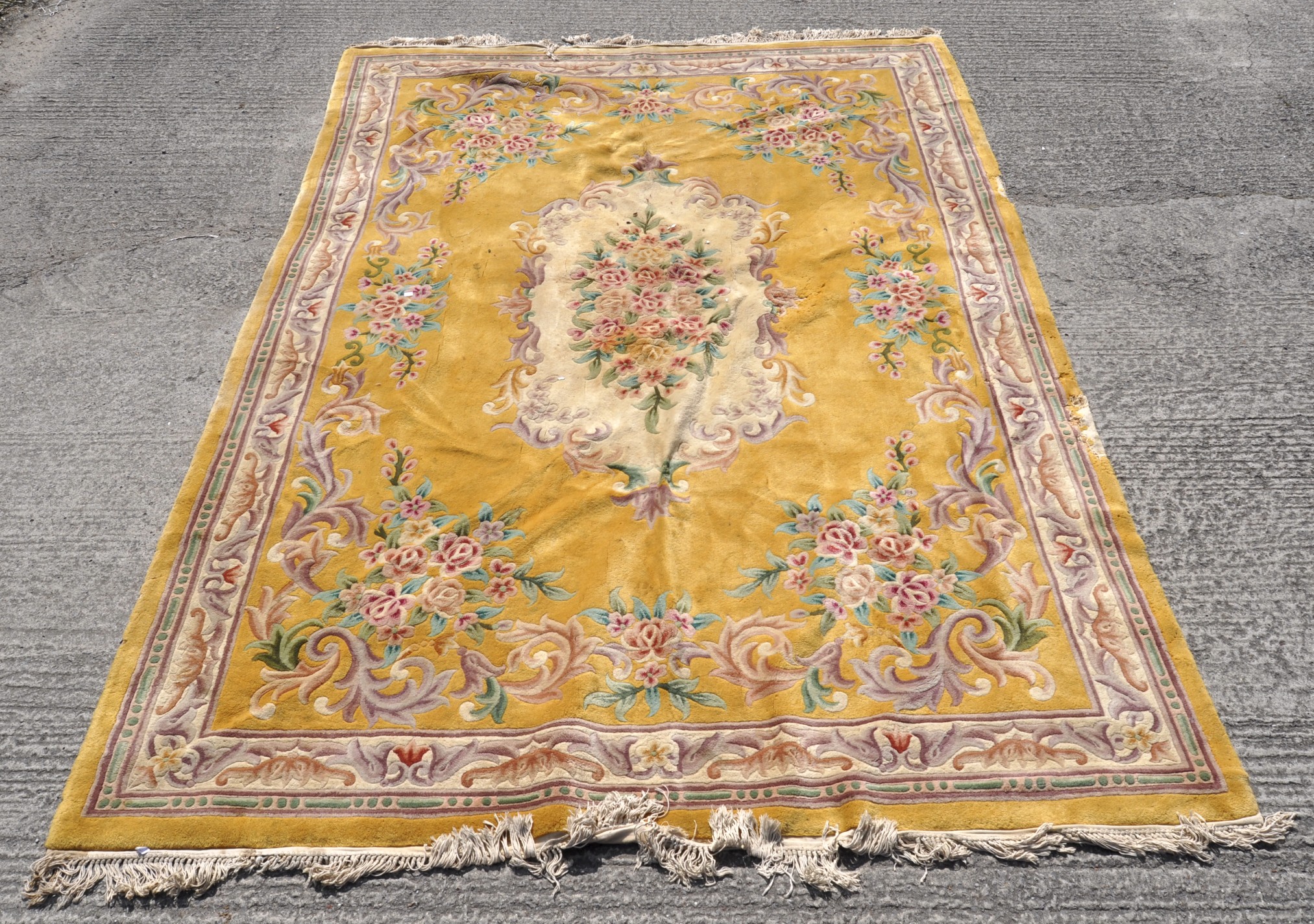 A modern Chinese large floral carpet with a yellow ground,