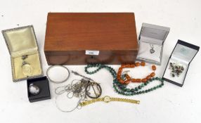 A collection of costume jewellery, including a cameo ring and brooch, necklaces, a silver pendant,