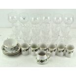 A group of cut crystal drinking glasses and a Doulton Larchmont pattern part coffee-service