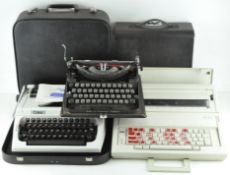 Three typewriters, including an early 20th century Imperial Typewriter Co.