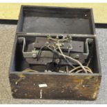 A portable Military transmitter, World War II period, fitted in wooden hinged case