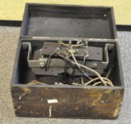 A portable Military transmitter, World War II period, fitted in wooden hinged case