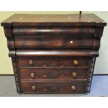 A Victorian mahogany chest of drawers, comprising a bureau above three long graduated handles,