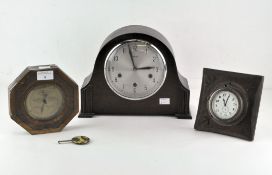 Two 20th century clocks, in wooden cases with Arabic numerals, one by Smiths,