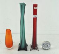 Two retro cased glass spirally moulded glass vases, an oviform vase and a paperweight