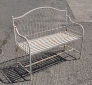 A white painted aluminium garden bench,