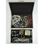 A box of costume jewellery, including rings, necklaces, cufflinks, earrings and more,