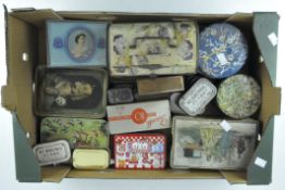 A collection of decorative storage tins including Oxo, Huntley and Palmers,