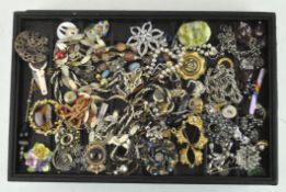 A quantity of costume jewellery, comprising necklaces, bracelets, earrings and more