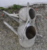 Two vintage galvanized 2 gallon metal watering cans