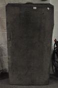 A large black canvas bound trunk,