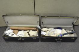Two suitcases containing cricket related items, including a Gunn & Moore bat, SP leg guards,