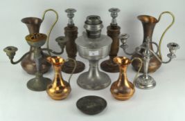 Assorted vintage metalware, to include; Four copper jugs, two silver plated candlesticks,