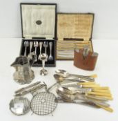 A hip flask and other flatware