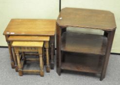 A 20th century nest of three oak occasional tables,