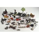 A selection of lead figures by Britains including animals and farm vehicles,