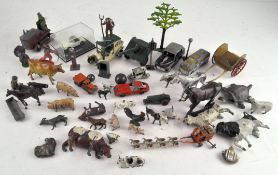 A selection of lead figures by Britains including animals and farm vehicles,