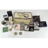 A selection of costume jewellery, necklaces, commemorative coins, a pair of earrings,