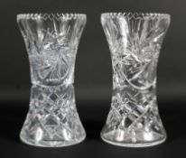 A pair of glass vases, 20th century, of waisted form, decorated with stars, sprials and diamonds,