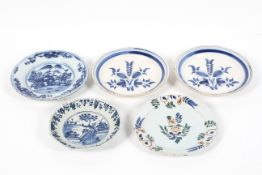 A collection of five Dutch and English Delft plates, 18th century,