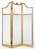 A late 19th century gilt wood and glass three fold screen,