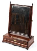 A Queen Anne style mahogany dressing table mirror, the swing mirror in moulded frame,