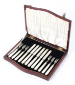 A canteen of six silver plated and mother of pearl mounted fruit knives and forks,