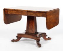 A William IV style mahogany sofa table, the D-end drop-leaf top above gadrooned rims,