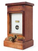 A GWR mahogany cased repeater, a single slot indicator fitted with an On/Off control knob,