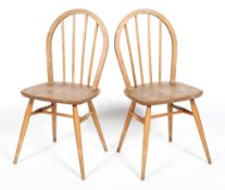 A pair of Ercol blonde elm and beech kitchen chairs,