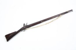 A Flint lock musket, stamped with crowned GR/Tower, with brass mounts, late 18th/early 19th century,