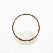 A yellow and white metal court shape 5.0mm wedding ring. Hallmarked 9ct gold, London. Size Q