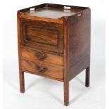 A Georgian mahogany tray top commode, with single door above a commode drawer,