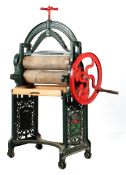 A Victorian mangle by Broughton Wilk, Banbury, red and green painted,