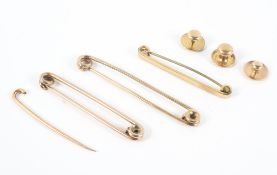 Two 9ct gold paperclips, together with three yellow metal pins and more,