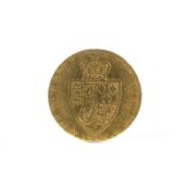 A George III gold guinea, shield back,