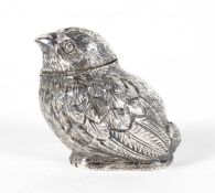 A novelty silver pepperette, modelled as a chick, London 1904,