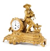 A French gilt metal mantel clock, the 3" enamelled dial on a brass movement,