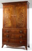 A mahogany linen press, early 19th century,