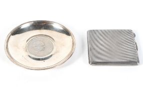 A silver compact, of square form, with engine turned decoration throughout,