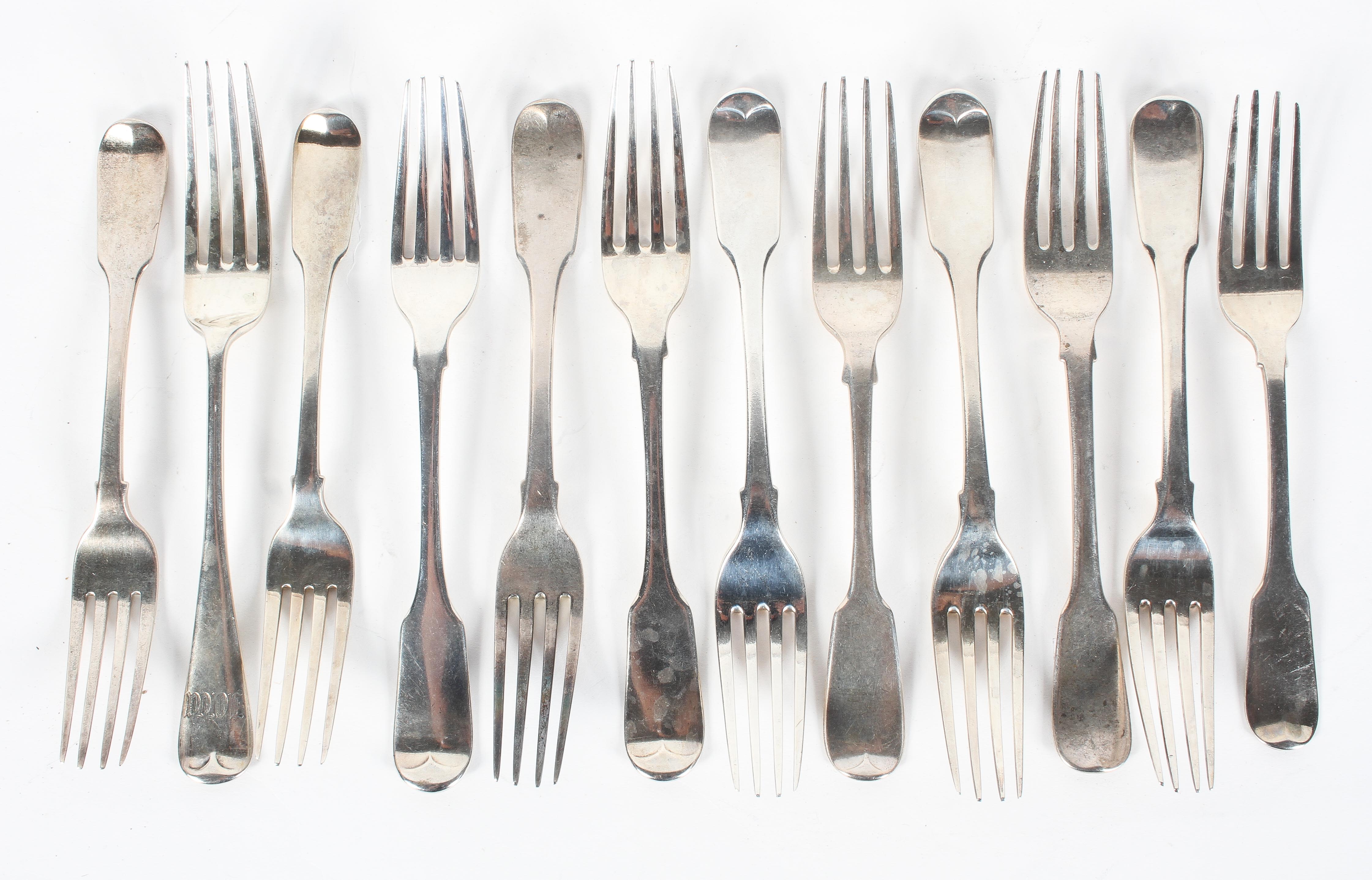 A collection of twelve assorted silver dessert forks, George III and later,