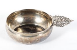 An Edwardian silver quaich, with pierced handle, makers mark HS, Sheffield 1904,