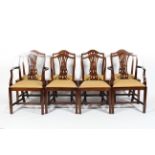 Six George III style mahogany dining chairs and two carvers,