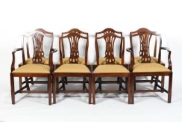Six George III style mahogany dining chairs and two carvers,